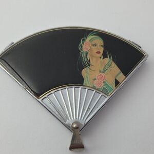 Vintage, fan-shaped compact mirror with bale.